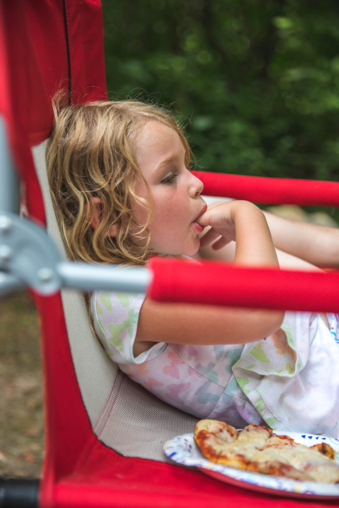 4 year old eats a naan pizza made over campfire | tent camping with toddlers