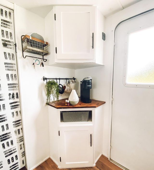 Corner counter in RV with coffee table and updated hardware