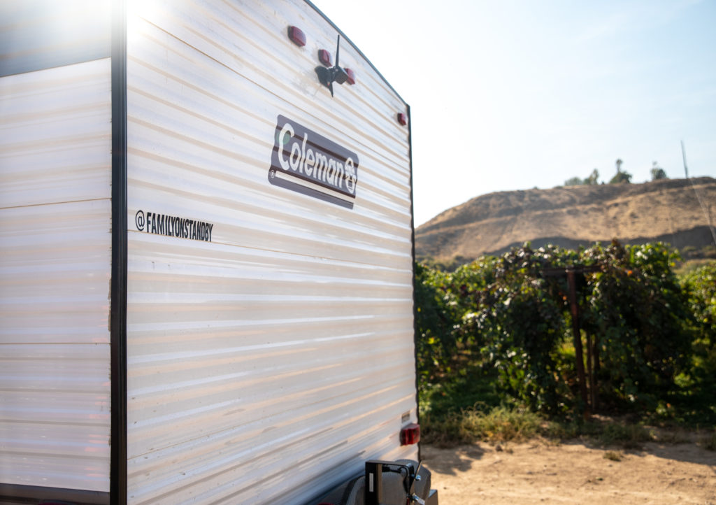 Family RV with name in vinyl on back