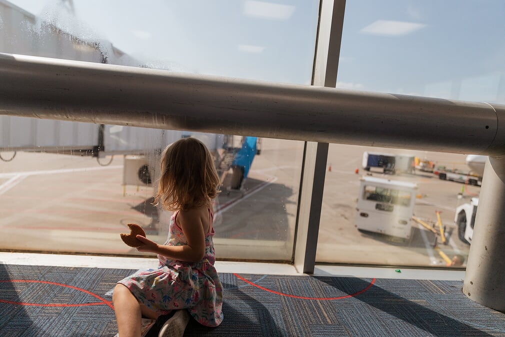 4-year-old hanging out in the airport while waiting for a standby flight
