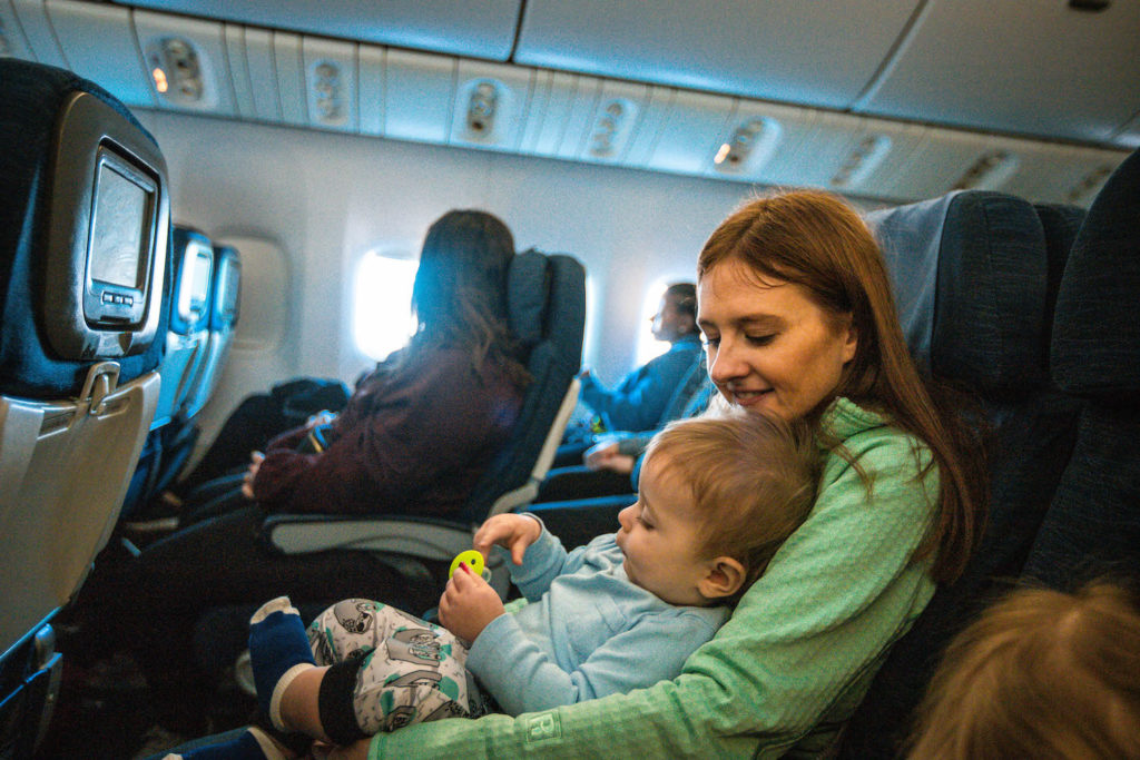 Mom with baby on plane