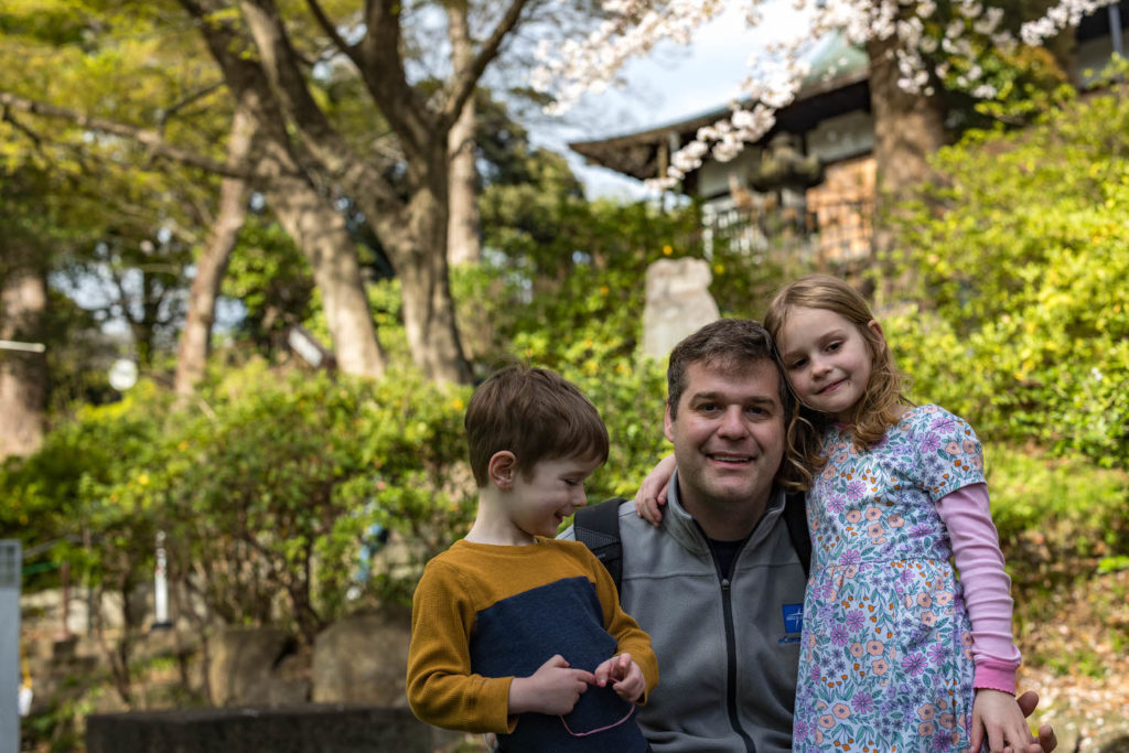 dad and kids during cherry blossom season tokyo japan