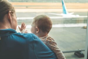 mom and infant at the airport